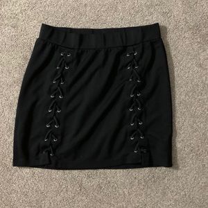 black short pencil skirt w/ cross ties details